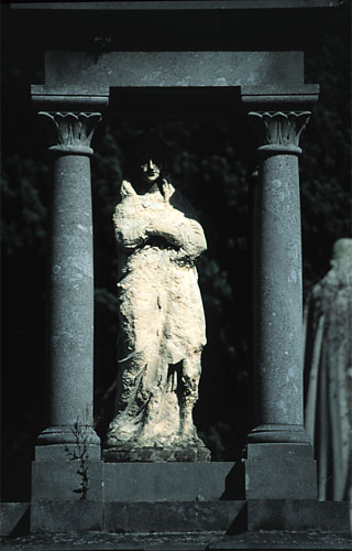 figure in ionic tomb